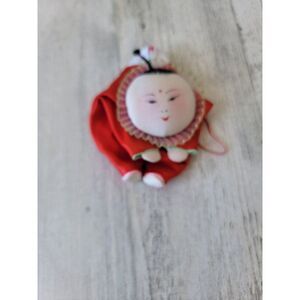 Unique Oriental laying boy red outfit Asian fabric ornament Xmas decor